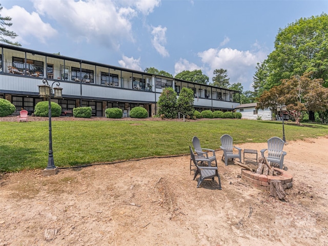 130 Old Mill Rd Unit 222, Flat Rock, NC 28731 - view of grassy yard featuring a fire pit