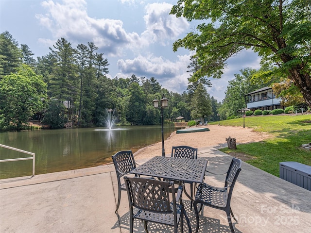 130 Old Mill Rd Unit 222, Flat Rock, NC 28731 - view of patio with a water view and outdoor dining space