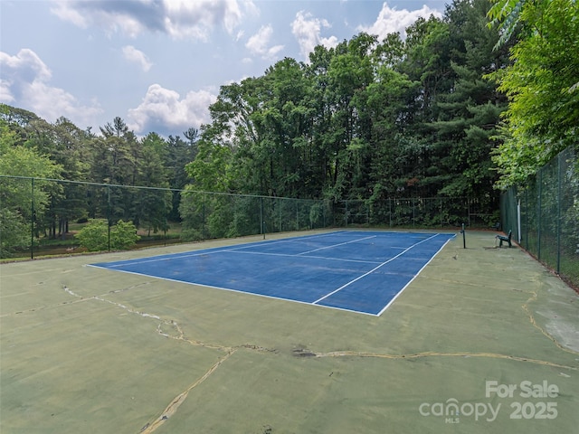 130 Old Mill Rd Unit 222, Flat Rock, NC 28731 - view of tennis court featuring a wooded view