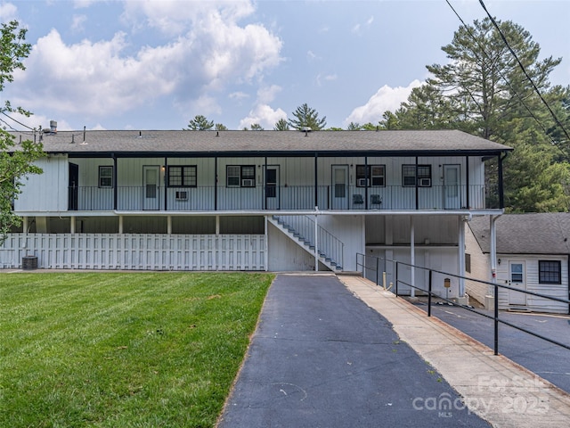 130 Old Mill Rd Unit 222, Flat Rock, NC 28731 - view of front of home featuring stairs, a porch, and a shingled roof