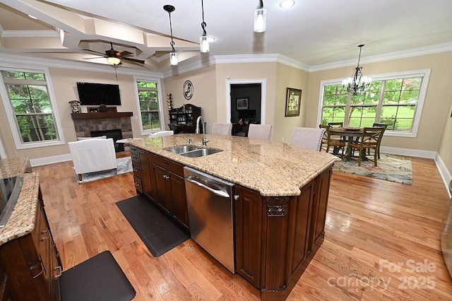 6302 Dwayne Starnes Dr, Hickory, NC 28602 - kitchen with dishwasher, a fireplace, a sink, ornamental molding, and baseboards
