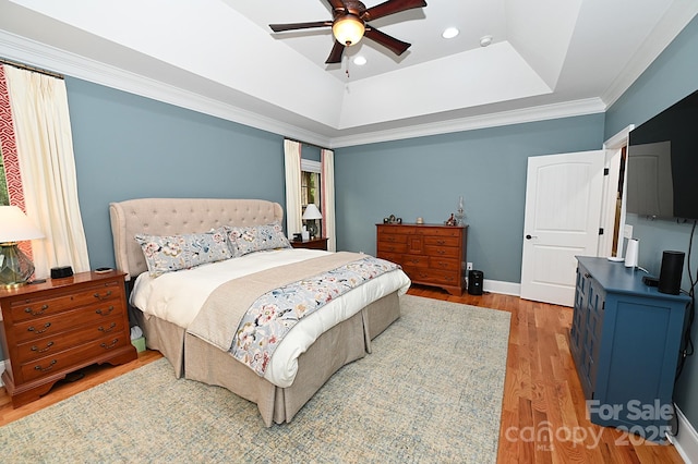 6302 Dwayne Starnes Dr, Hickory, NC 28602 - bedroom with light wood finished floors, a raised ceiling, ceiling fan, recessed lighting, and crown molding