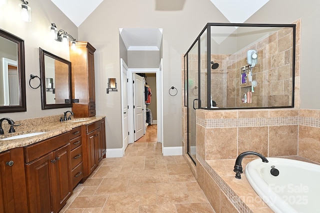 6302 Dwayne Starnes Dr, Hickory, NC 28602 - full bathroom with a stall shower, a bath, double vanity, a walk in closet, and baseboards