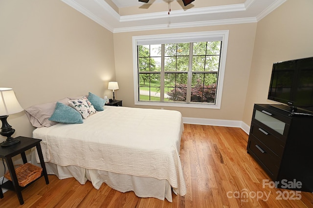 6302 Dwayne Starnes Dr, Hickory, NC 28602 - bedroom with crown molding, light wood-style flooring, baseboards, and ceiling fan