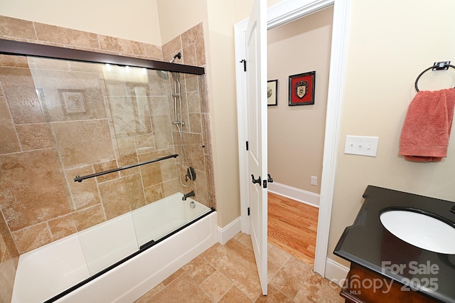 6302 Dwayne Starnes Dr, Hickory, NC 28602 - full bath with combined bath / shower with glass door, vanity, and baseboards