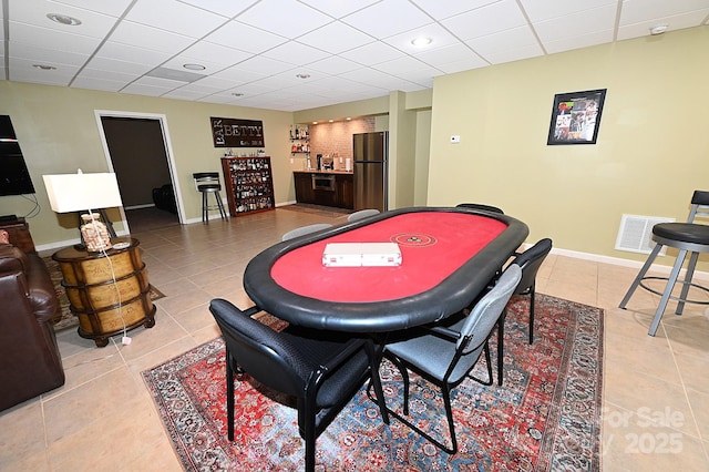 6302 Dwayne Starnes Dr, Hickory, NC 28602 - playroom featuring light tile patterned floors, bar area, a paneled ceiling, and baseboards