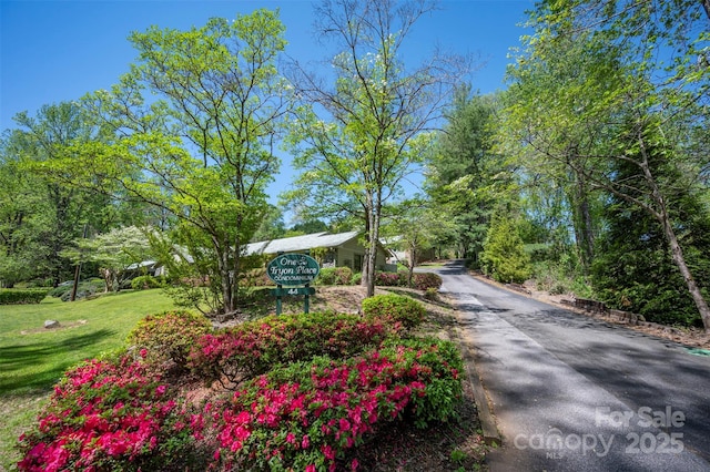 44 Jervey Rd Unit 3A, Tryon, NC 28782 - community / neighborhood sign featuring a yard and asphalt driveway