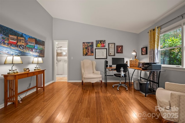 44 Jervey Rd Unit 3A, Tryon, NC 28782 - office featuring vaulted ceiling, hardwood / wood-style floors, and baseboards