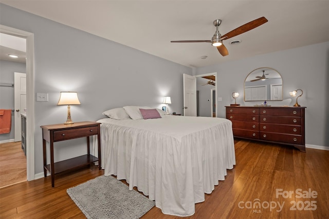 44 Jervey Rd Unit 3A, Tryon, NC 28782 - bedroom featuring wood finished floors, baseboards, and a ceiling fan