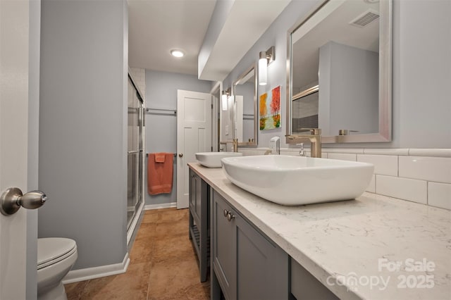 44 Jervey Rd Unit 3A, Tryon, NC 28782 - full bathroom with toilet, a shower stall, and double vanity