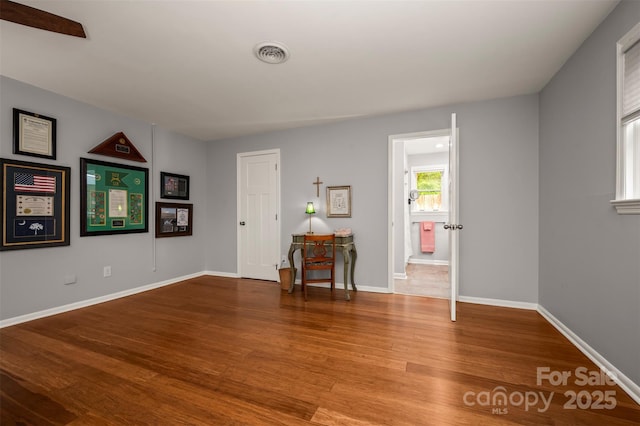 44 Jervey Rd Unit 3A, Tryon, NC 28782 - empty room with wood finished floors and baseboards