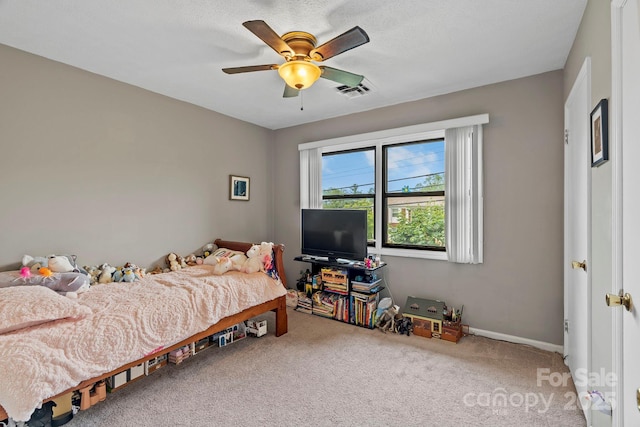 427 6th Ave W Unit B-8, Hendersonville, NC 28739 - carpeted bedroom with baseboards and a ceiling fan