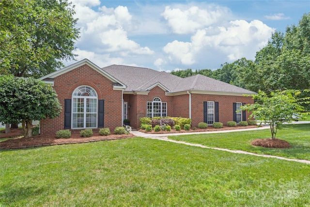 502 Roxanne Ct NW, Concord, NC 28027 - view of front of property featuring brick siding and a front yard