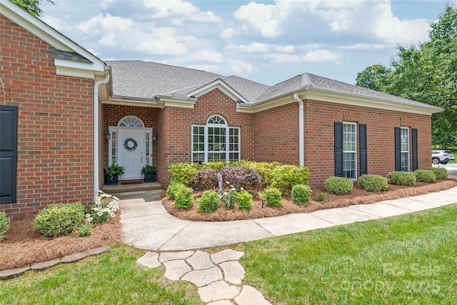 502 Roxanne Ct NW, Concord, NC 28027 - view of front of home featuring brick siding and a shingled roof
