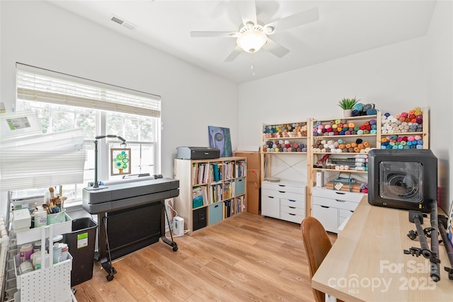 502 Roxanne Ct NW, Concord, NC 28027 - office area featuring light wood finished floors and a ceiling fan