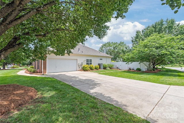 502 Roxanne Ct NW, Concord, NC 28027 - view of front facade with concrete driveway, a garage, and brick siding