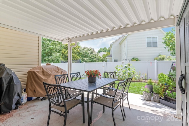 502 Roxanne Ct NW, Concord, NC 28027 - fenced backyard with a patio, outdoor dining space, and area for grilling