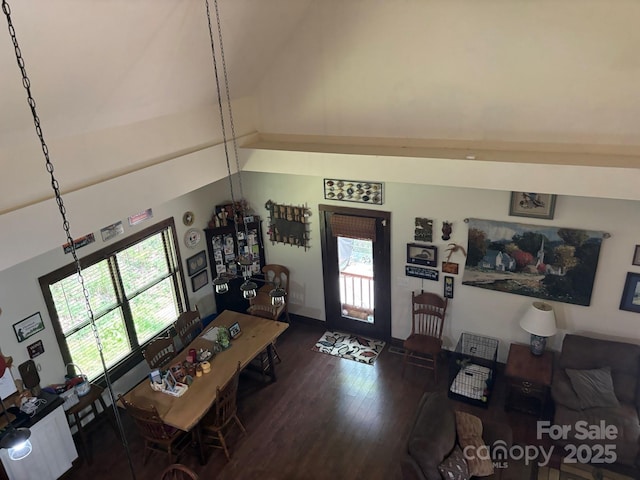 76 Six Springs Rd, Spruce Pine, NC 28777 - living area with wood finished floors, healthy amount of natural light, and high vaulted ceiling