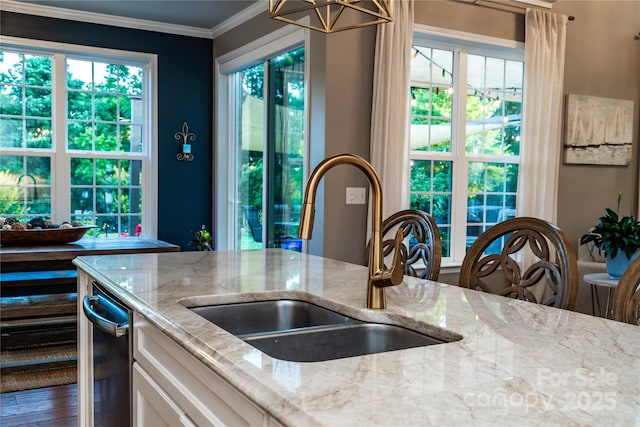 159 Holly Ridge Dr, Mooresville, NC 28115 - kitchen featuring a sink, light stone countertops, white cabinets, and crown molding