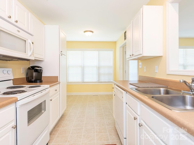 1271 Applewood Ln, York, SC 29745 - kitchen featuring white appliances, a sink, baseboards, white cabinets, and light countertops