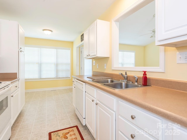 1271 Applewood Ln, York, SC 29745 - kitchen featuring white appliances, a sink, white cabinetry, and baseboards