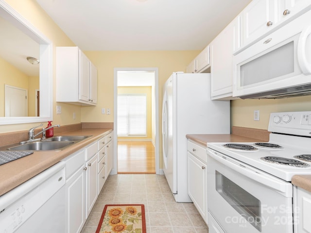 1271 Applewood Ln, York, SC 29745 - kitchen with white appliances, a sink, white cabinets, light tile patterned flooring, and light countertops