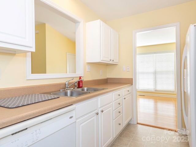 1271 Applewood Ln, York, SC 29745 - kitchen with white appliances, a sink, white cabinets, and light countertops
