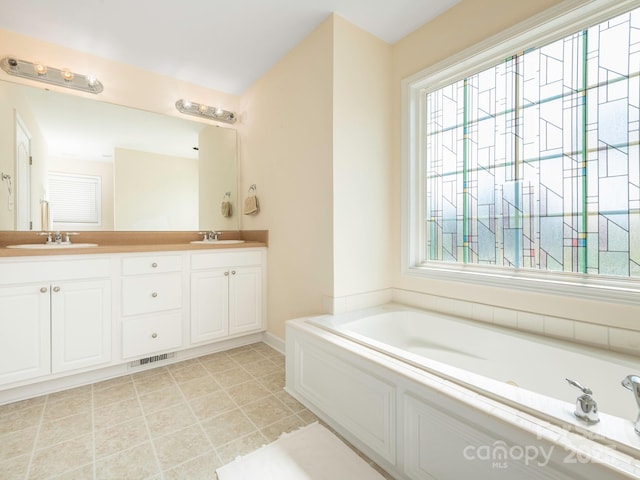 1271 Applewood Ln, York, SC 29745 - full bath featuring a garden tub and double vanity