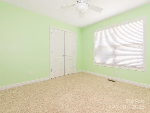 1271 Applewood Ln, York, SC 29745 - unfurnished bedroom featuring carpet, baseboards, a closet, and ceiling fan