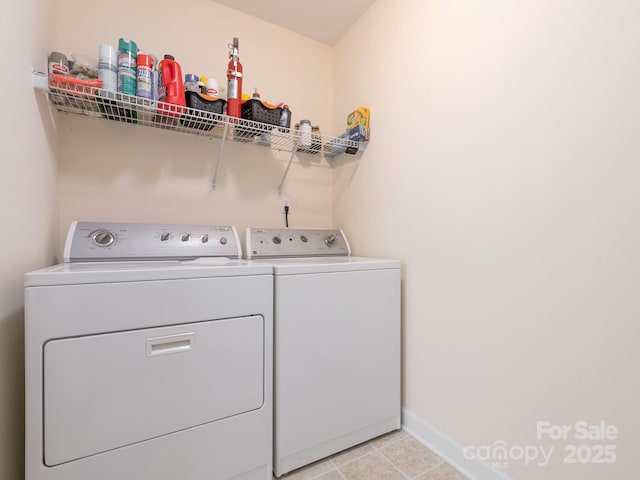 1271 Applewood Ln, York, SC 29745 - laundry area featuring washer and dryer, baseboards, and light tile patterned flooring