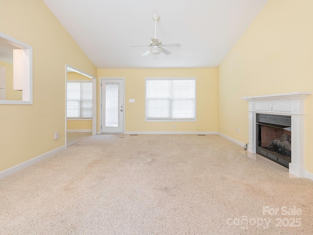 1271 Applewood Ln, York, SC 29745 - unfurnished living room with ceiling fan, lofted ceiling, a fireplace with flush hearth, healthy amount of natural light, and carpet floors