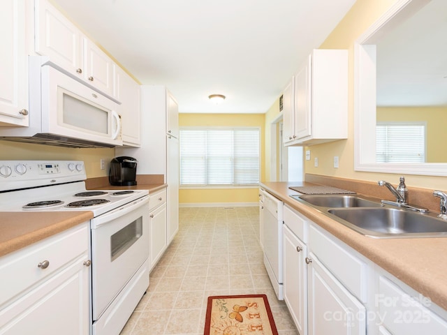 1271 Applewood Ln, York, SC 29745 - kitchen featuring white appliances, a sink, white cabinetry, baseboards, and light countertops
