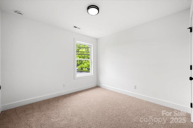 1600/1602 Bluff St, Albemarle, NC 28001 - unfurnished room with light carpet, baseboards, and a smoke detector