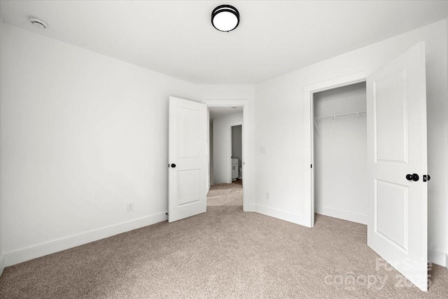1600/1602 Bluff St, Albemarle, NC 28001 - unfurnished bedroom with light carpet, baseboards, and a closet
