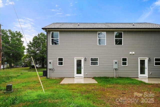 1600/1602 Bluff St, Albemarle, NC 28001 - back of property featuring a yard, a patio area, and central AC