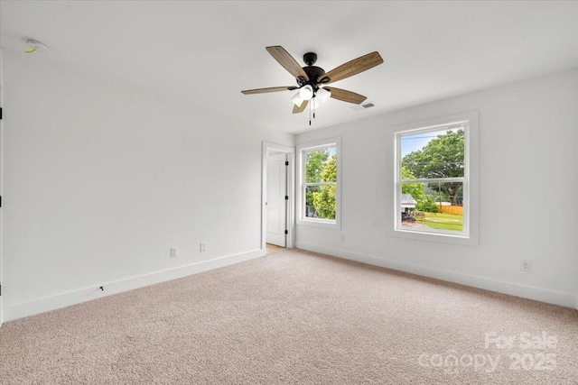 1600/1602 Bluff St, Albemarle, NC 28001 - unfurnished room featuring baseboards, light colored carpet, and a ceiling fan