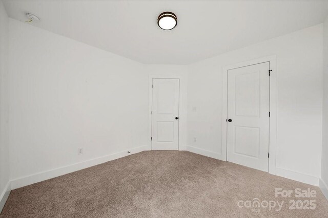 1600/1602 Bluff St, Albemarle, NC 28001 - carpeted spare room with baseboards