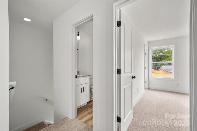 1600/1602 Bluff St, Albemarle, NC 28001 - corridor with an upstairs landing, light carpet, and baseboards