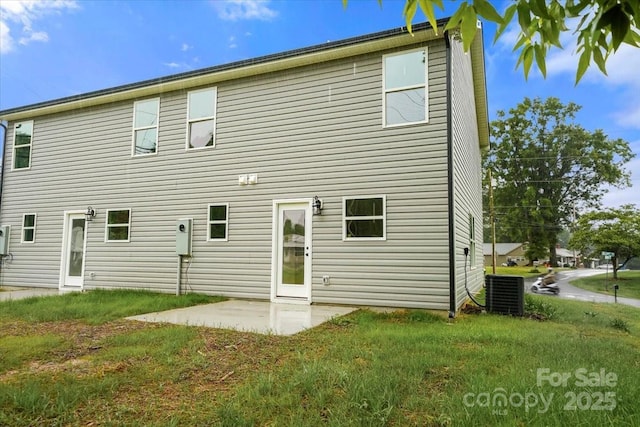 1600/1602 Bluff St, Albemarle, NC 28001 - rear view of house with a patio, a lawn, and central AC