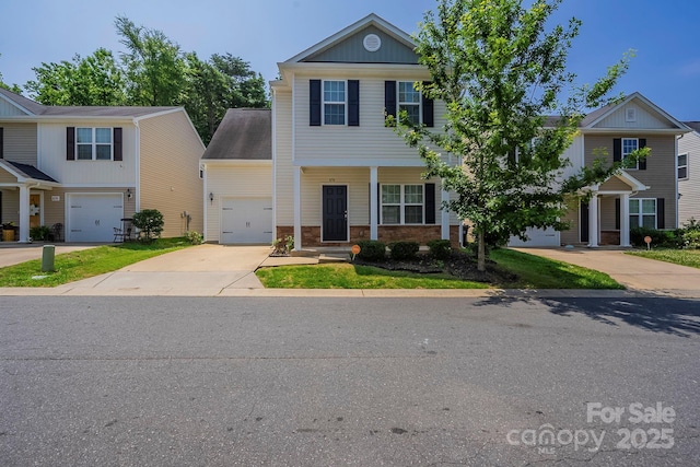 8226 Gabon Ct, Charlotte, NC 28215 - view of front of property featuring driveway and brick siding
