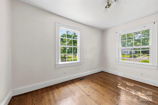 505 Franklin Ave, Shelby, NC 28150 - unfurnished room featuring baseboards and wood finished floors