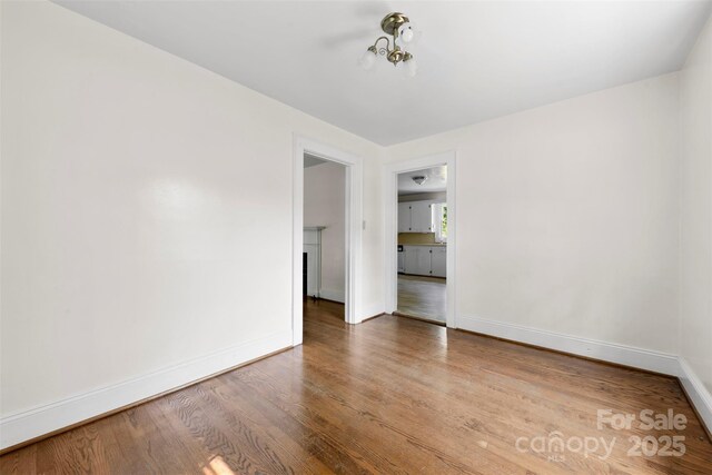 505 Franklin Ave, Shelby, NC 28150 - spare room featuring wood finished floors and baseboards