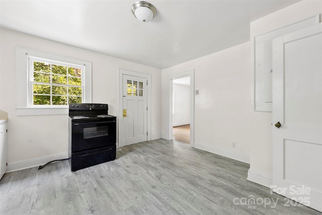 505 Franklin Ave, Shelby, NC 28150 - kitchen featuring electric range, baseboards, and light wood finished floors