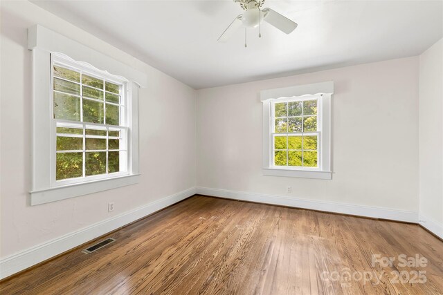 505 Franklin Ave, Shelby, NC 28150 - empty room featuring wood finished floors, baseboards, and a ceiling fan