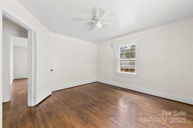 505 Franklin Ave, Shelby, NC 28150 - spare room with wood finished floors, a ceiling fan, and baseboards