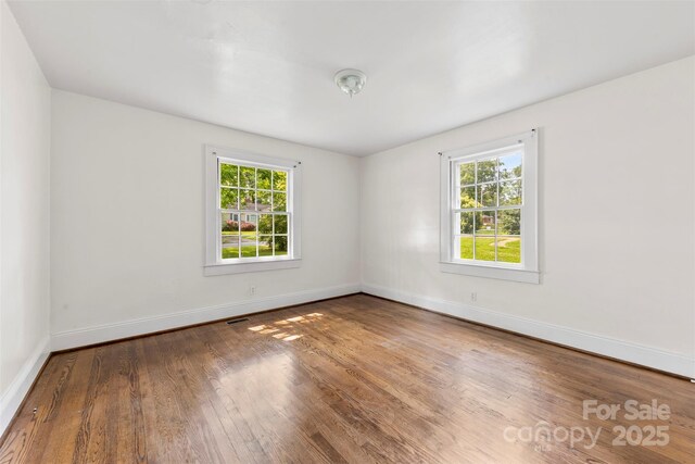 505 Franklin Ave, Shelby, NC 28150 - unfurnished room featuring wood finished floors and baseboards