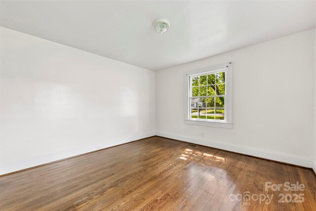 505 Franklin Ave, Shelby, NC 28150 - unfurnished room with baseboards and wood finished floors