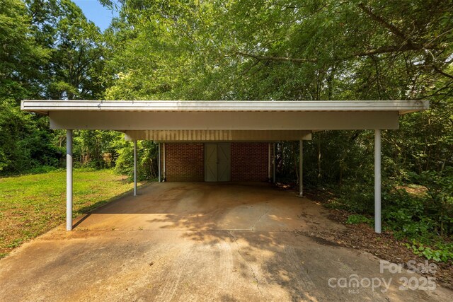 505 Franklin Ave, Shelby, NC 28150 - view of car parking featuring a carport and driveway