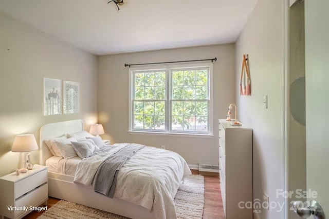 7320 Ritter Dr, Charlotte, NC 28270 - bedroom with wood finished floors and baseboards