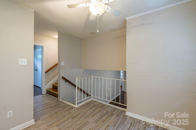 7320 Ritter Dr, Charlotte, NC 28270 - empty room with wood finished floors and ceiling fan